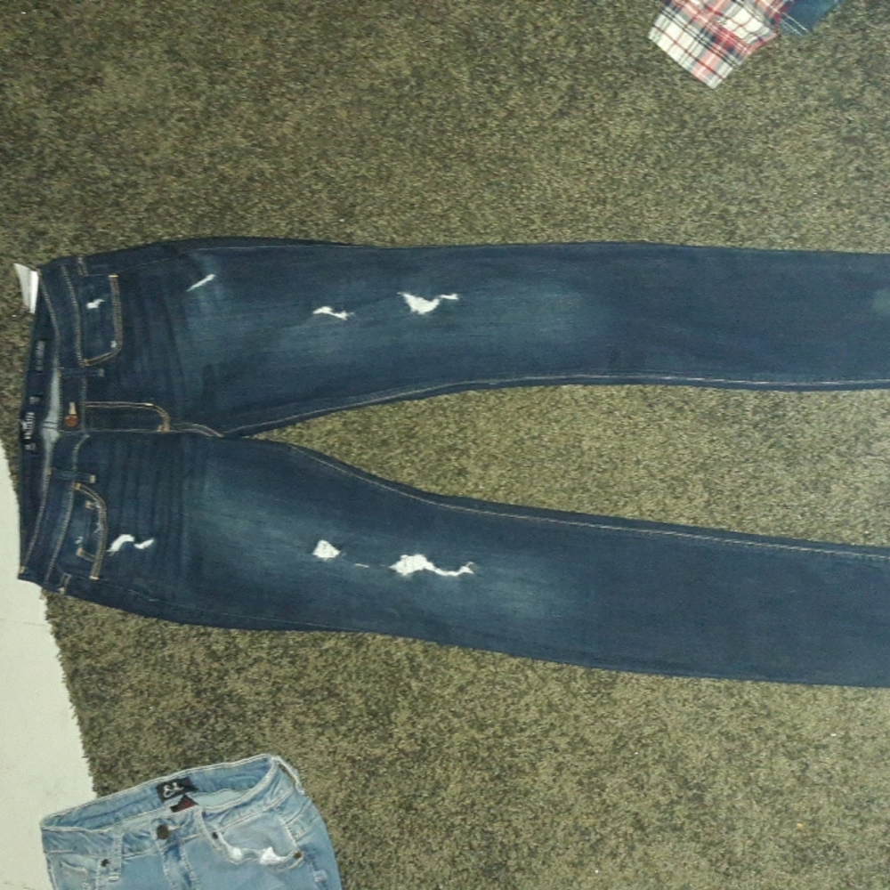 Dark blue faded ripped jeans, size 7R W28 L30